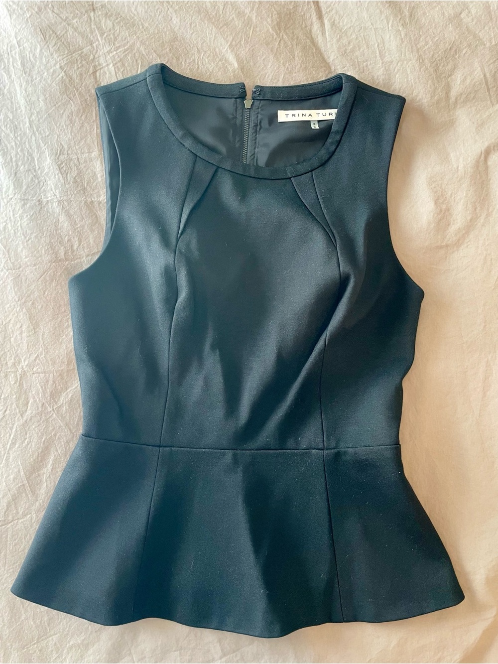 Trina Turk Black Sleeveless Polished Peplum Full zip back 15” ptp EUC size 2